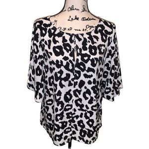 Loft blouse ,black & white animal print . Dolman sleeves loose fit , silky Sz L